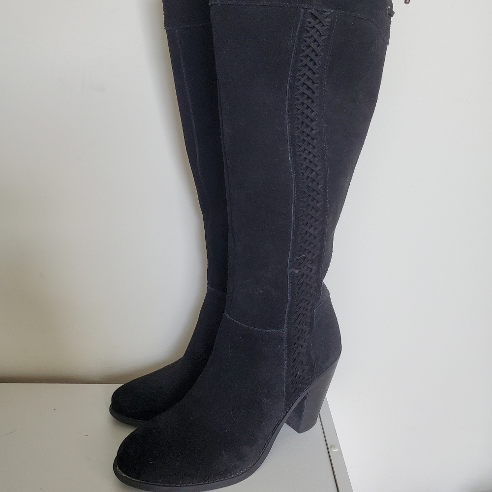 Knee high heeled boots